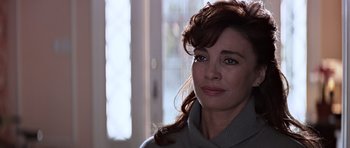 Movie still from “Clear and Present Danger” (1994), directed by Phillip Noyce – A person wearing a sweater; Close Up shot, Over the shoulder angle