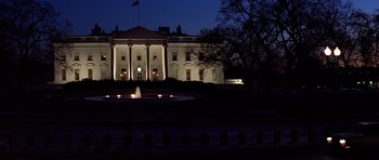 Movie still from “Clear and Present Danger” (1994), directed by Phillip Noyce – The white house is lit up at night time; Extreme Wide shot, Low angle