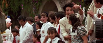 Movie still from “Clear and Present Danger” (1994), directed by Phillip Noyce – A group of people standing next to each other; Medium shot, Over the shoulder angle