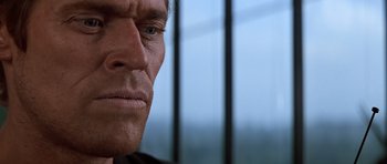 Movie still from “Clear and Present Danger” (1994), directed by Phillip Noyce – A man's face in front of a window; Close Up shot, Over the shoulder angle