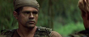 Movie still from “Clear and Present Danger” (1994), directed by Phillip Noyce – A person wearing a hat; Close Up shot, Low angle