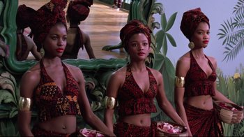 Movie still from “Coming to America” (1988), directed by John Landis – A group of young women standing next to each other; Medium shot, Low angle
