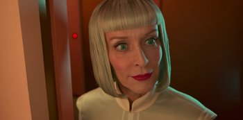 Movie still from “Big Bug” (2022), directed by Jean-Pierre Jeunet – A person wearing a white shirt; Close Up shot, Low angle