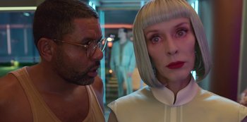 Movie still from “Big Bug” (2022), directed by Jean-Pierre Jeunet – A man and a woman standing next to each other; Close Up shot, Low angle