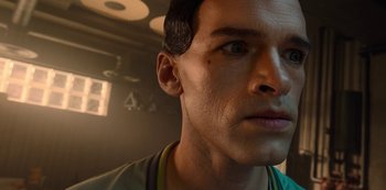 Movie still from “Big Bug” (2022), directed by Jean-Pierre Jeunet – A person's face in a room; Close Up shot, High angle