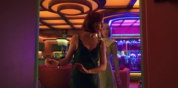 Movie still from “Big Bug” (2022), directed by Jean-Pierre Jeunet – Two women are standing in front of each other; Medium shot, Low angle