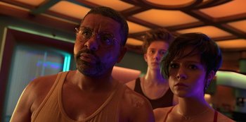 Movie still from “Big Bug” (2022), directed by Jean-Pierre Jeunet – A group of people standing next to each other in a room; Close Up shot, Low angle