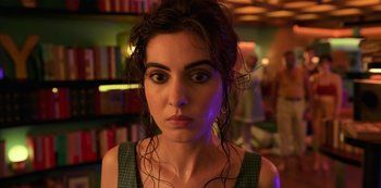 Movie still from “Big Bug” (2022), directed by Jean-Pierre Jeunet – A person with wet hair; Close Up shot, Low angle