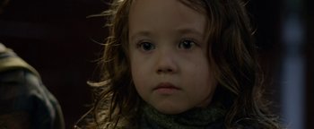 Movie still from “Bird Box” (2018), directed by Susanne Bier – A young child's face; Close Up shot, Over the shoulder angle