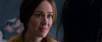 Movie still from “Bird Box” (2018), directed by Susanne Bier – A woman's face looking at the camera; Close Up shot, Over the shoulder angle