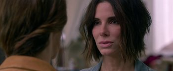 Movie still from “Bird Box” (2018), directed by Susanne Bier – A person wearing a shirt; Close Up shot, Over the shoulder angle