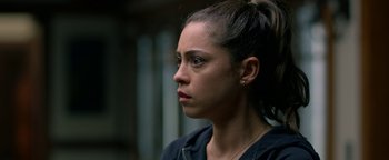 Movie still from “Bird Box” (2018), directed by Susanne Bier – A person wearing a black shirt; Close Up shot, Over the shoulder angle