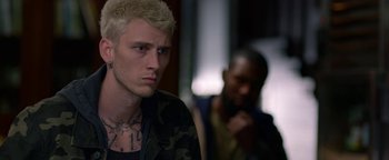 Movie still from “Bird Box” (2018), directed by Susanne Bier – A man with a tattoo on his arm and a man with a beard on his head; Close Up shot, Over the shoulder angle