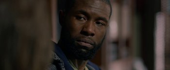 Movie still from “Bird Box” (2018), directed by Susanne Bier – A person with a beard; Close Up shot, Over the shoulder angle