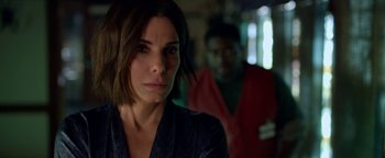 Movie still from “Bird Box” (2018), directed by Susanne Bier – A woman looking at the camera; Close Up shot, Over the shoulder angle