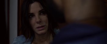 Movie still from “Bird Box” (2018), directed by Susanne Bier – A woman's face in front of another woman; Close Up shot, Over the shoulder angle