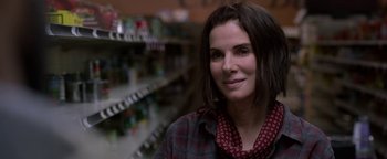 Movie still from “Bird Box” (2018), directed by Susanne Bier – A person in a store; Close Up shot, Over the shoulder angle