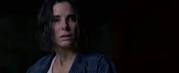 Movie still from “Bird Box” (2018), directed by Susanne Bier – A person wearing a robe; Close Up shot, Over the shoulder angle