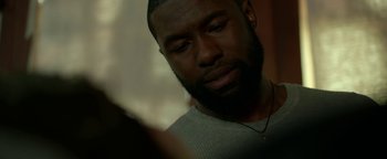 Movie still from “Bird Box” (2018), directed by Susanne Bier – A person with a beard; Close Up shot, Over the shoulder angle