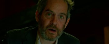 Movie still from “Bird Box” (2018), directed by Susanne Bier – A person with green eyes; Close Up shot, High angle