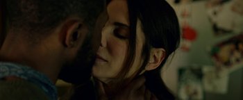 Movie still from “Bird Box” (2018), directed by Susanne Bier – A person with their eyes closed; Close Up shot, Over the shoulder angle