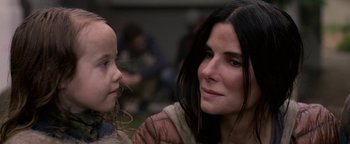 Movie still from “Bird Box” (2018), directed by Susanne Bier – A woman and a little girl looking at each other; Close Up shot, Over the shoulder angle