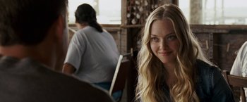 Movie still from “Dear John” (2010), directed by Lasse Hallström – A beautiful blond woman sitting in front of another woman; Close Up shot, Over the shoulder angle
