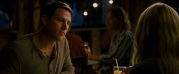 Movie still from “Dear John” (2010), directed by Lasse Hallström – A man sitting at a table in front of a woman; Close Up shot, Over the shoulder angle