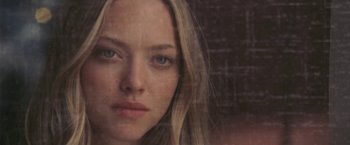 Movie still from “Dear John” (2010), directed by Lasse Hallström – A woman's face in front of a window; Close Up shot, Over the shoulder angle