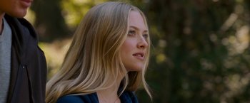 Movie still from “Dear John” (2010), directed by Lasse Hallström – A woman with long blonde hair looking to her left; Close Up shot, Over the shoulder angle