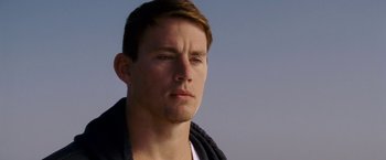 Movie still from “Dear John” (2010), directed by Lasse Hallström – A person wearing a jacket; Close Up shot, Low angle