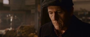 Movie still from “Dear John” (2010), directed by Lasse Hallström – A person wearing a hat; Close Up shot, Over the shoulder angle