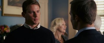 Movie still from “Dear John” (2010), directed by Lasse Hallström – A man and a woman standing next to each other in a room; Close Up shot, Over the shoulder angle