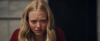 Movie still from “Dear John” (2010), directed by Lasse Hallström – A young blonde haired woman looking sad with her eyes wide open; Close Up shot, High angle