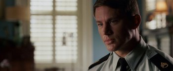 Movie still from “Dear John” (2010), directed by Lasse Hallström – A person wearing a uniform; Close Up shot, Over the shoulder angle