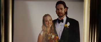 Movie still from “Dear John” (2010), directed by Lasse Hallström – A man and a woman posing for a wedding picture; Extreme Close Up shot, High angle