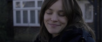 Movie still from “Disobedience” (2017), directed by Sebastián Lelio – A person with her eyes closed; Close Up shot, Over the shoulder angle