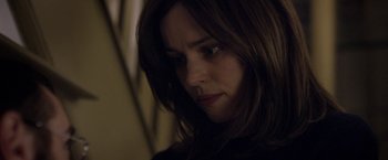 Movie still from “Disobedience” (2017), directed by Sebastián Lelio – A person with long brown hair; Close Up shot, Over the shoulder angle