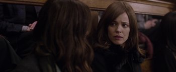 Movie still from “Disobedience” (2017), directed by Sebastián Lelio – A woman looking at herself in the mirror; Close Up shot, Over the shoulder angle