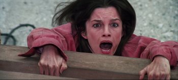 Movie still from “Earthquake” (1974), directed by Mark Robson – A person with her mouth wide open; Close Up shot, Overhead angle