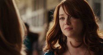 Movie still from “Easy A” (2010), directed by Will Gluck – A person with long red hair; Close Up shot, Over the shoulder angle