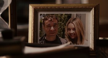 Movie still from “Easy A” (2010), directed by Will Gluck – A man and a woman are in a picture frame; Extreme Close Up shot, Overhead angle