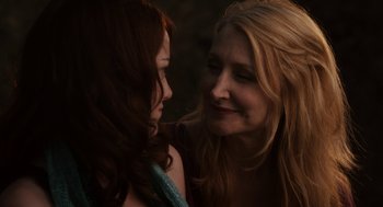 Movie still from “Easy A” (2010), directed by Will Gluck – A woman and a girl standing next to each other; Close Up shot, Over the shoulder angle