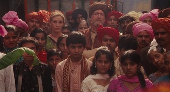 Movie still from “Eat Pray Love” (2010), directed by Ryan Murphy – A large group of people in traditional indian garb; Medium shot, High angle
