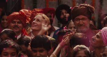 Movie still from “Eat Pray Love” (2010), directed by Ryan Murphy – A group of people standing next to each other; Medium shot, Over the shoulder angle