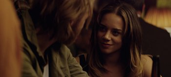 Movie still from “Black Mirror” (2011), created by Charlie Brooker – A man and a woman talking to each other; Close Up shot, Over the shoulder angle