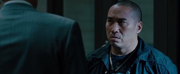 Movie still from “Fast & Furious” (2009), directed by Justin Lin – A person looking at a mirror; Close Up shot, Over the shoulder angle