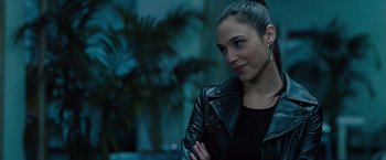 Movie still from “Fast & Furious” (2009), directed by Justin Lin – A person wearing a leather jacket; Close Up shot, Over the shoulder angle