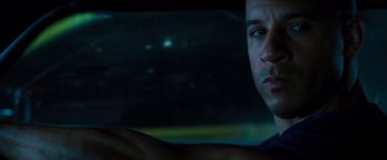 Movie still from “Fast & Furious” (2009), directed by Justin Lin – A man's face in a car; Close Up shot, Over the shoulder angle