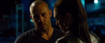 Movie still from “Fast & Furious” (2009), directed by Justin Lin – A man and a woman looking at one another; Close Up shot, Over the shoulder angle